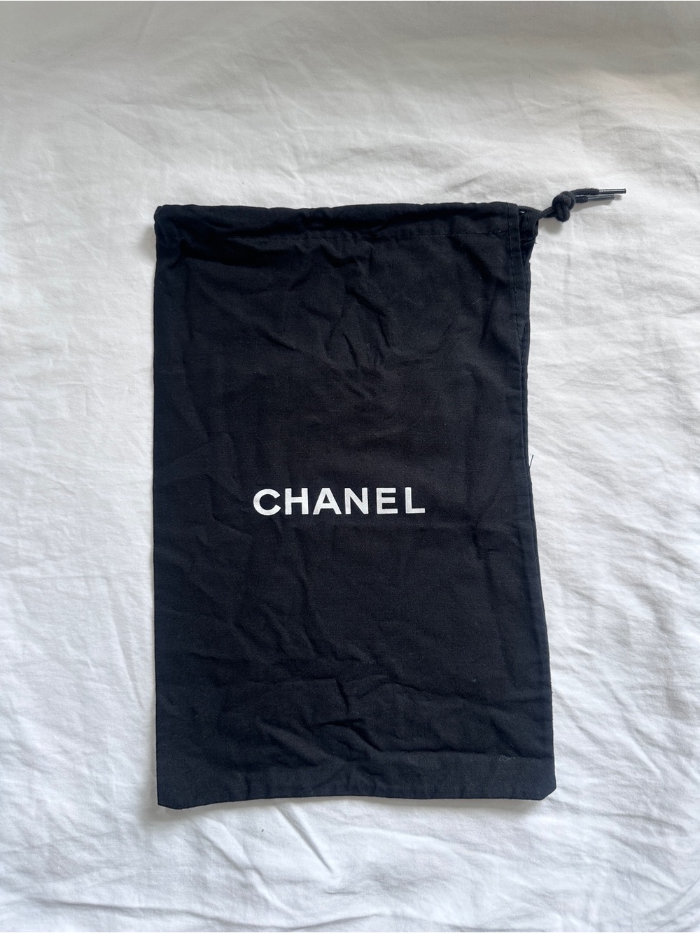 CHANEL Black and White Logo Drawstring Pouch